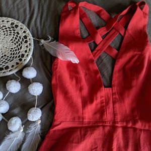 Beautiful open back dress by
NBD x Naven Twins